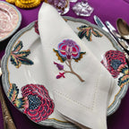 Embroidered linen dinner napkin with creative embroidery inspired by persian floral art