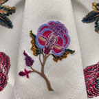 Embroidered linen dinner napkin with creative embroidery inspired by persian floral art