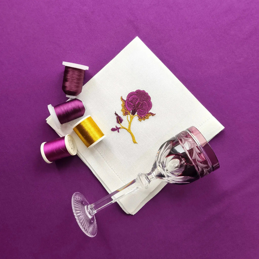 Embroidered linen dinner napkin with creative embroidery inspired by persian floral art