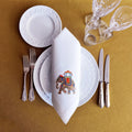 Embroidered linen dinner napkin with creative embroidery inspired by Indian decorated elephant