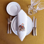 Embroidered linen dinner napkin with creative embroidery inspired by Indian decorated elephant