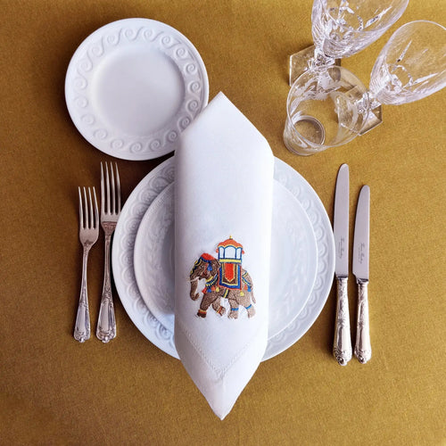 Embroidered linen dinner napkin with creative embroidery inspired by Indian decorated elephant