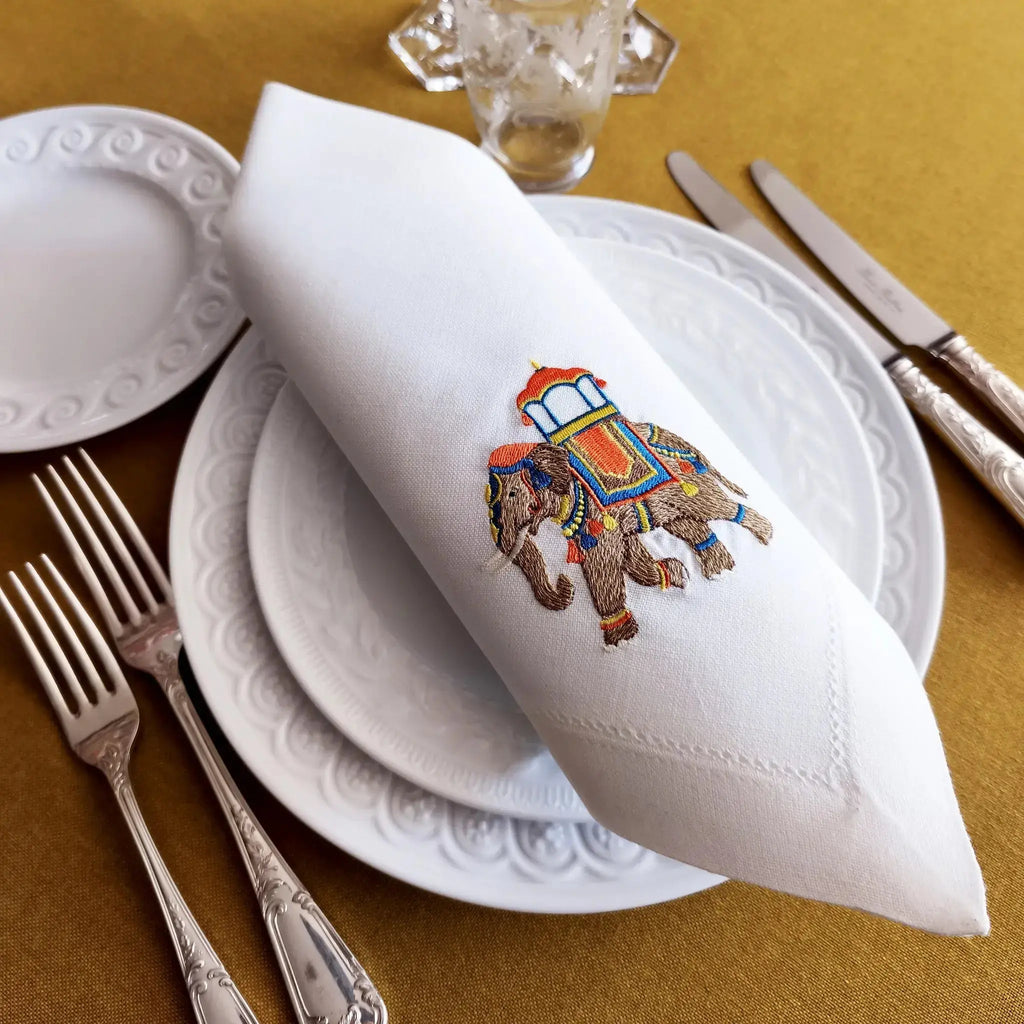 Embroidered linen dinner napkin with creative embroidery inspired by Indian decorated elephant