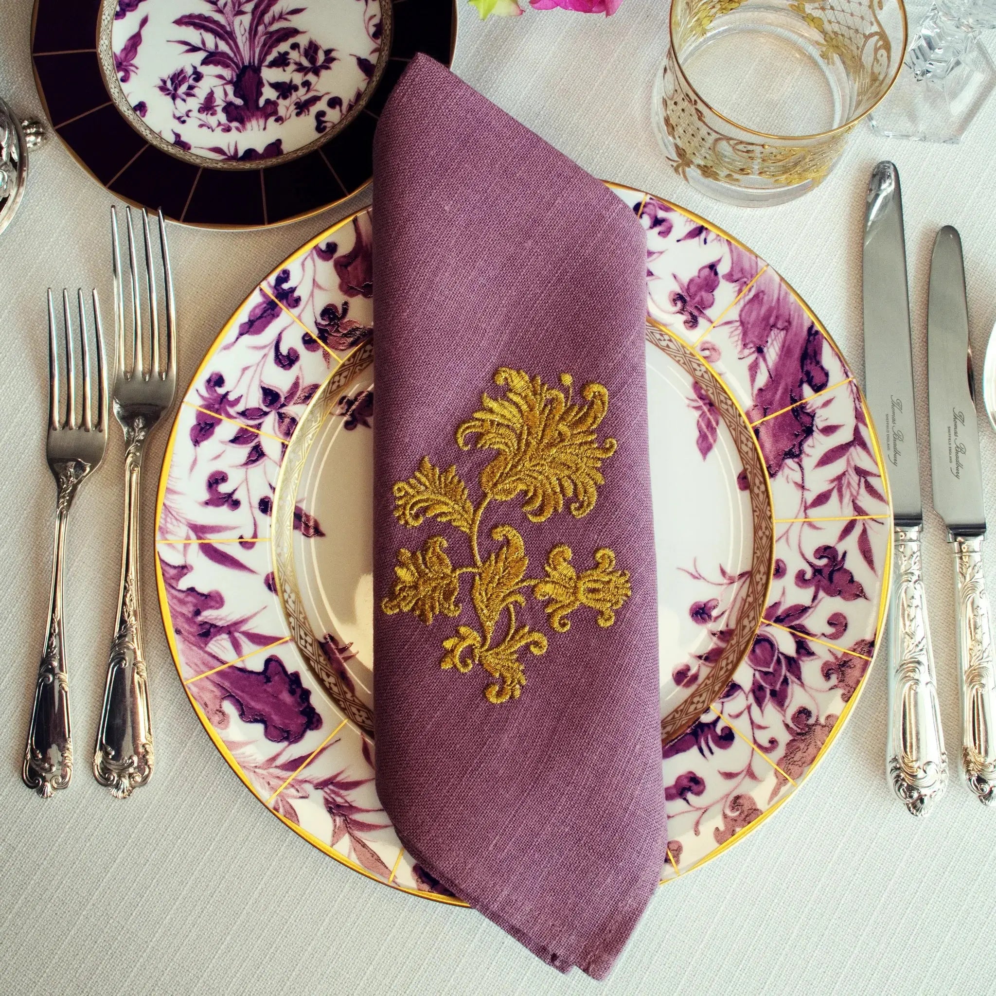 Embroidered linen dinner napkin with creative embroidery inspired by persian floral art