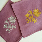Embroidered linen dinner napkin with creative embroidery inspired by persian floral art