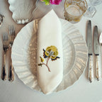 Embroidered linen dinner napkin with creative embroidery inspired by persian floral art