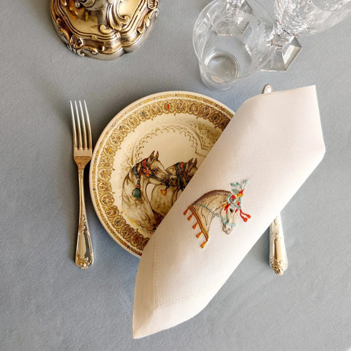Embroidered linen dinner napkin with creative embroidery inspired by Arabian horse