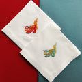 Elegant table cotton linen table napkins with embroidery design inspired by asian foo dog's design