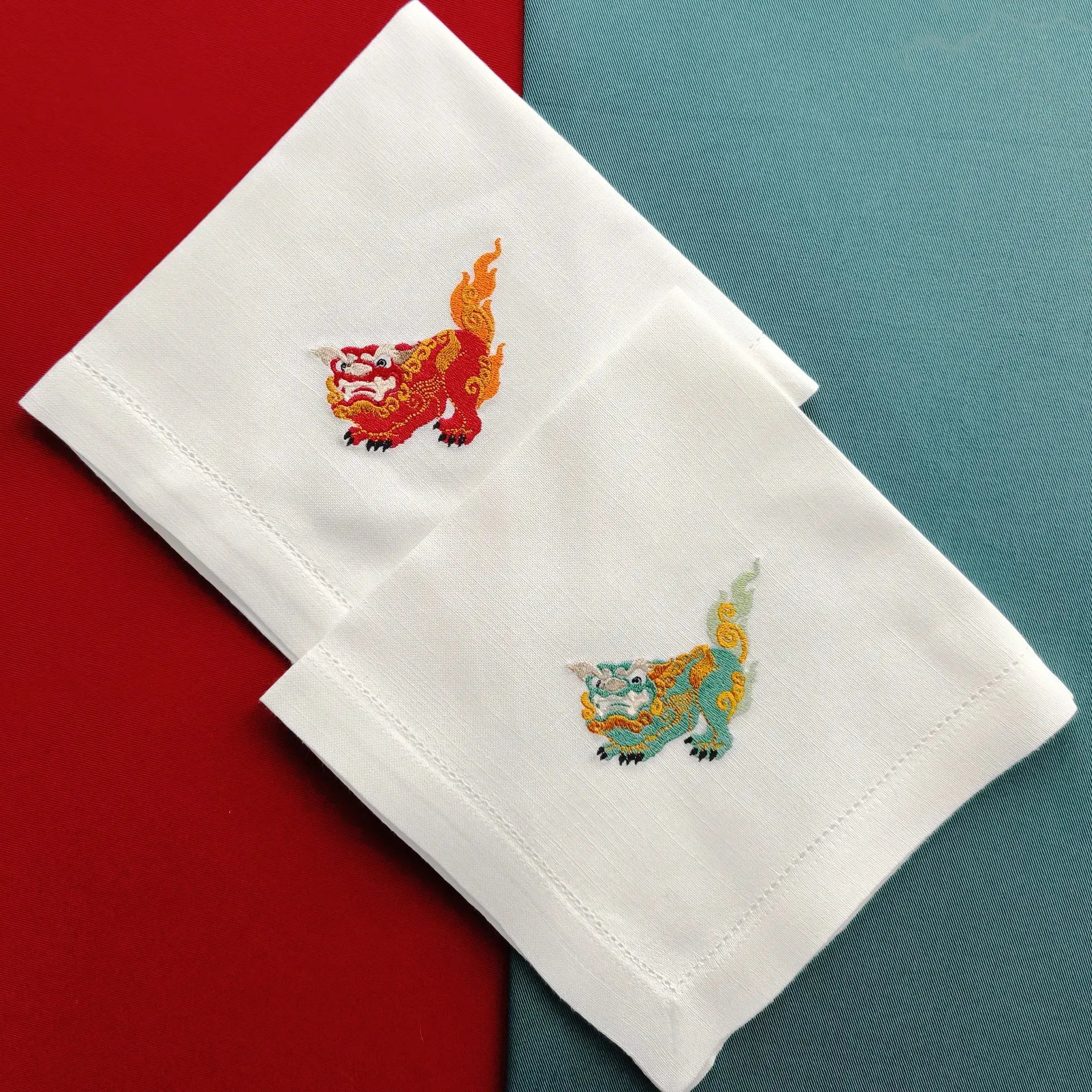 Elegant table cotton linen table napkins with embroidery design inspired by asian foo dog's design